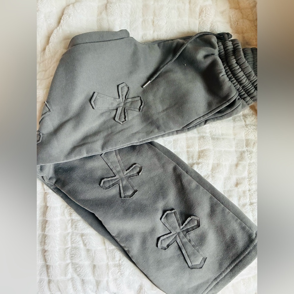 Gray sweatpants with crosses